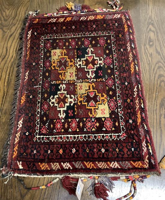 An Afghan geometric saddle bag, 80 x 54cm